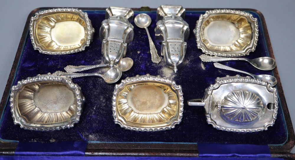 A late Victorian cased silver seven piece condiments set and five spoons (one associated), John Round, Sheffield, 1896.